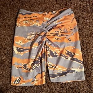 Lyrics Energy Biker Shorts in Orange Wolf Tiger Camo 
M